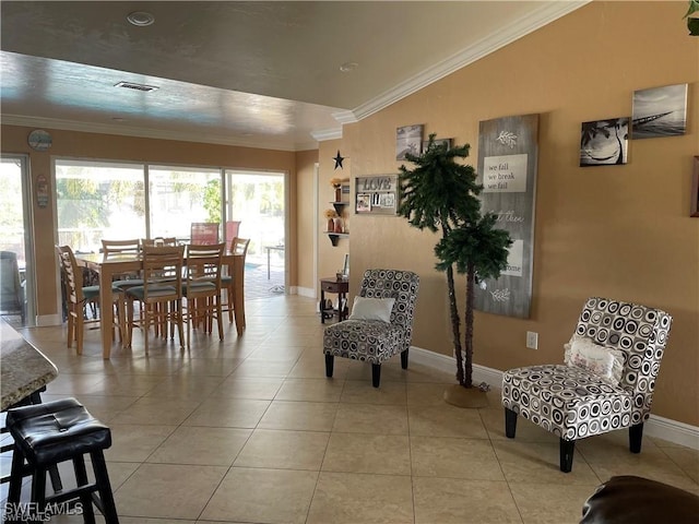 dining space featuring light tile patterned floors and ornamental molding