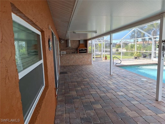 pool featuring a patio and area for grilling