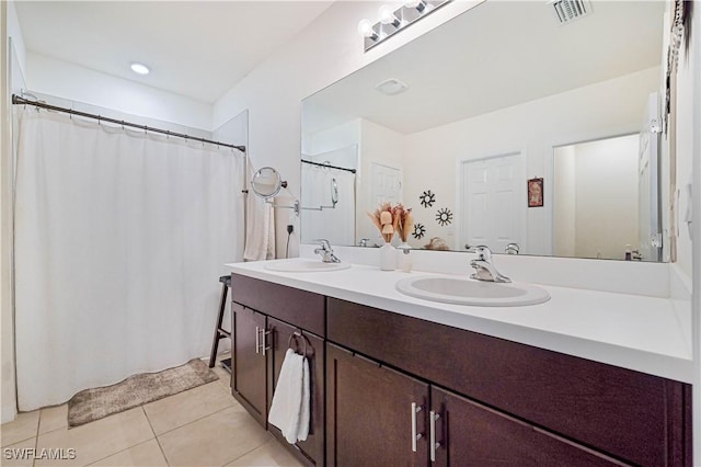 bathroom featuring vanity and tile patterned floors