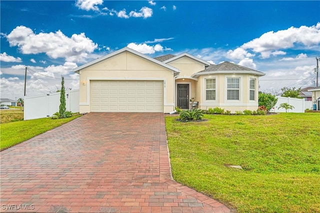 view of front of property featuring a garage and a front lawn