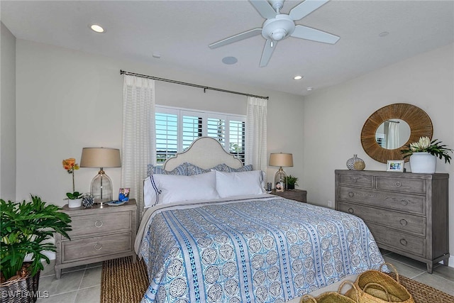 tiled bedroom with ceiling fan