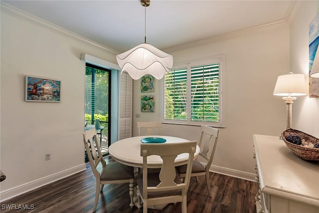 dining space featuring dark hardwood / wood-style floors and ornamental molding