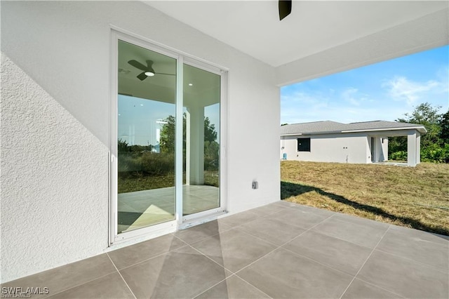 view of patio with ceiling fan