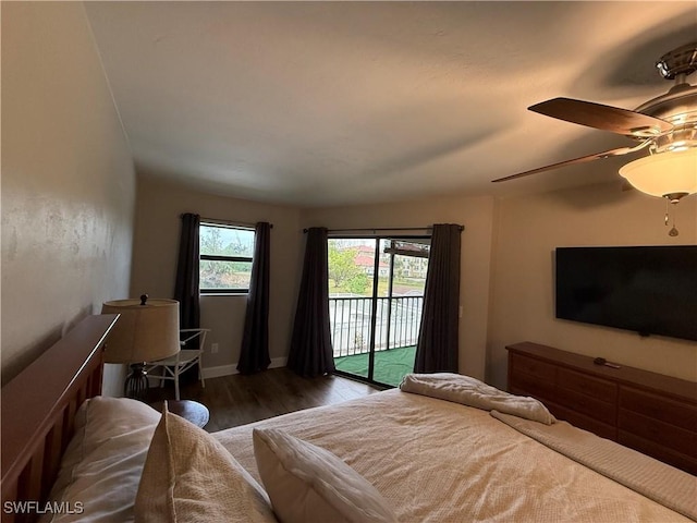 bedroom with dark hardwood / wood-style flooring, access to exterior, and ceiling fan