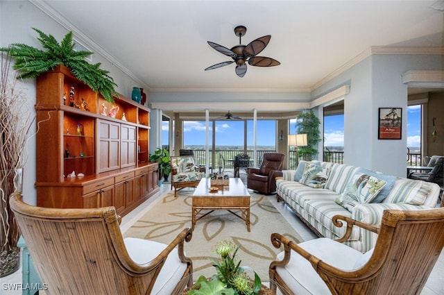 living room with ceiling fan and crown molding