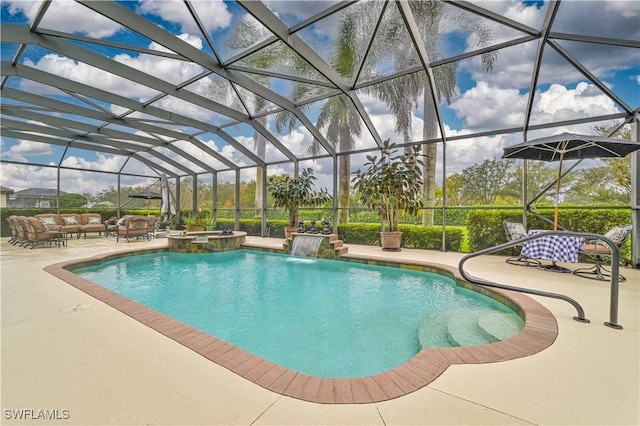 view of pool featuring an in ground hot tub, a lanai, an outdoor hangout area, and a patio