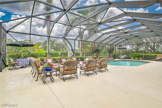 view of pool with an outdoor living space, a patio, and a lanai