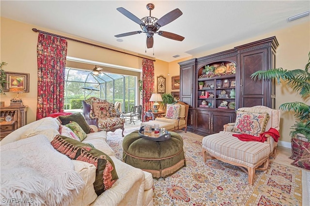 living room with ceiling fan