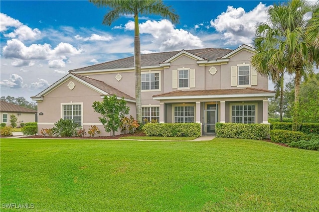 view of front of house featuring a front lawn