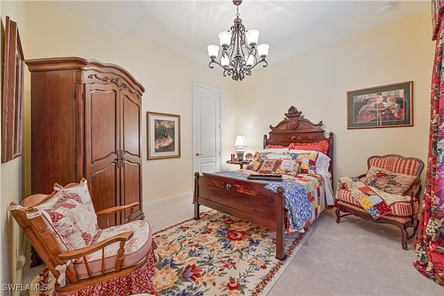 carpeted bedroom featuring a chandelier