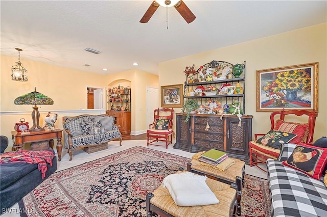 living room featuring ceiling fan