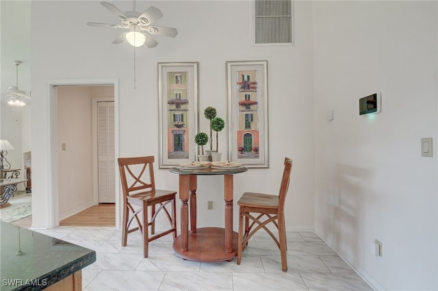 dining room with ceiling fan