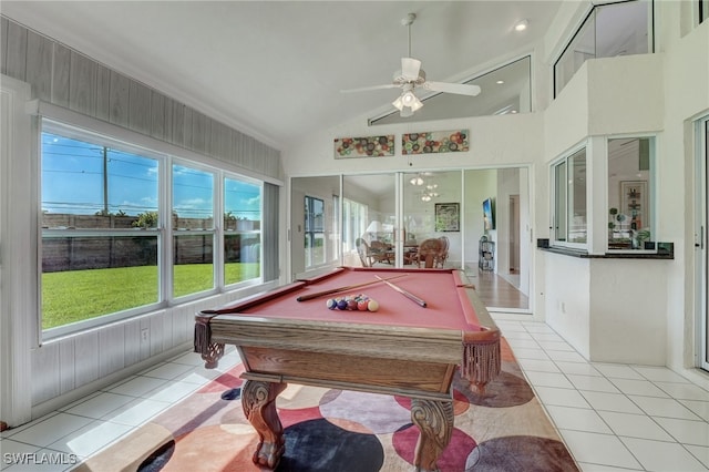 playroom with ceiling fan, vaulted ceiling, light tile patterned floors, and billiards