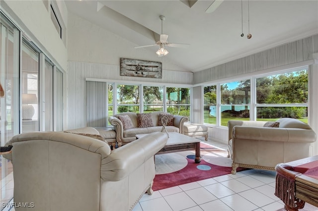 sunroom with ceiling fan and lofted ceiling