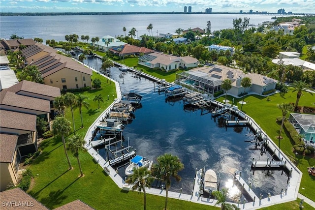 birds eye view of property featuring a water view