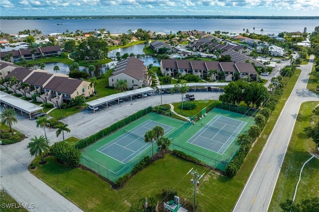 bird's eye view with a water view