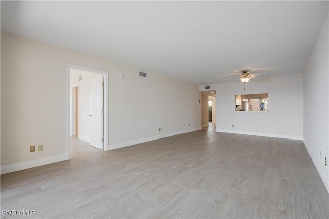 unfurnished living room with light hardwood / wood-style flooring and ceiling fan