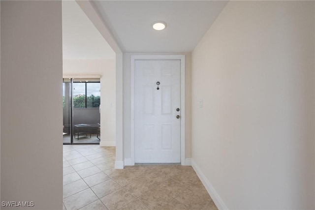 interior space with light tile patterned floors