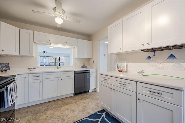 kitchen featuring sink, ceiling fan, range, white cabinetry, and black dishwasher