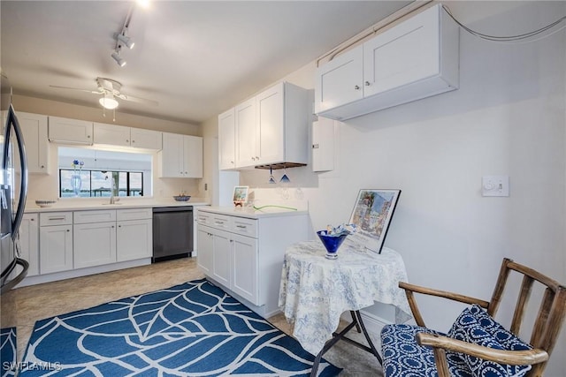 kitchen featuring ceiling fan, dishwasher, and white cabinets