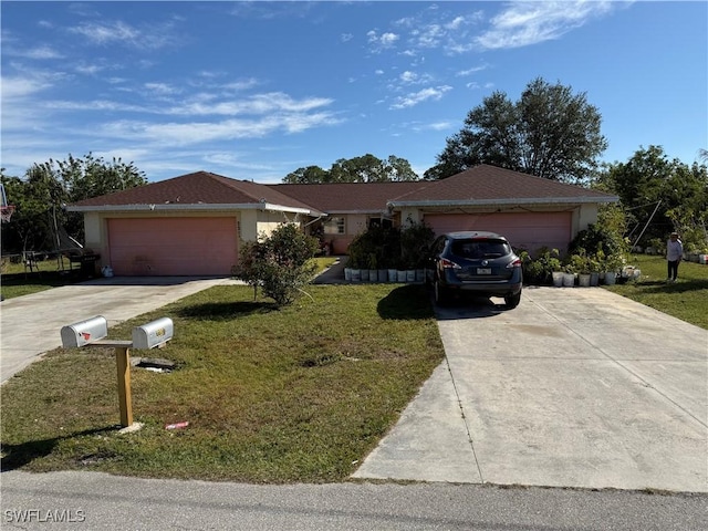 2205/2207 Armour Rd, Lehigh Acres, FL 33973 - single story home featuring concrete driveway, a garage, and a front yard