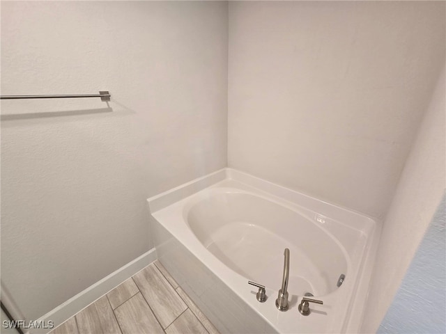 3102 E 2nd St, Lehigh Acres, FL 33936 - full bathroom featuring a garden tub