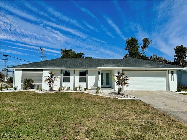 ranch-style home featuring a garage and a front yard