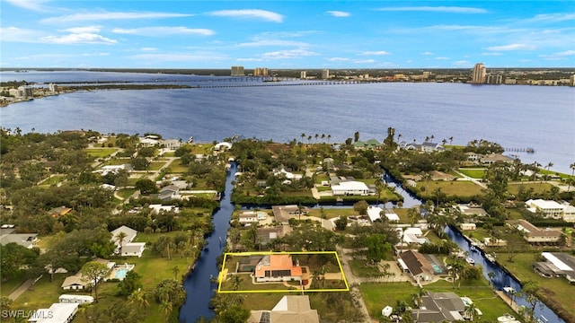 bird's eye view with a water view