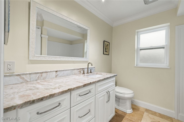 bathroom featuring vanity, toilet, and crown molding