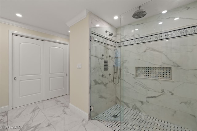 bathroom featuring crown molding and a shower with shower door