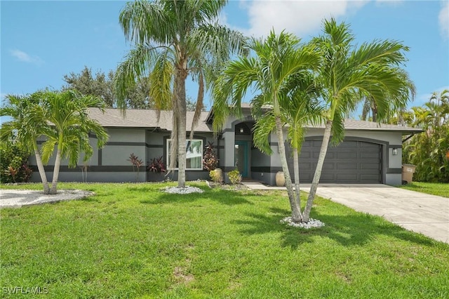 ranch-style home featuring a garage and a front lawn