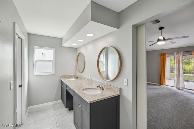 bathroom featuring vanity and ceiling fan