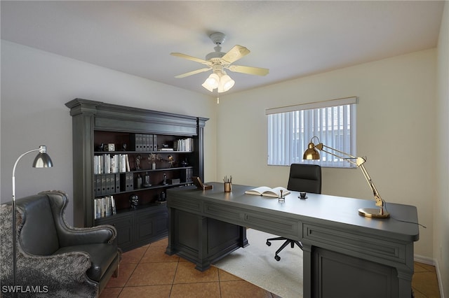 office area featuring light tile patterned floors and ceiling fan