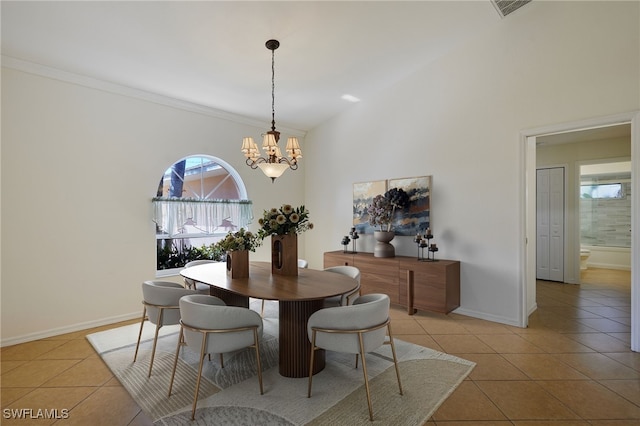 dining space featuring visible vents, ornamental molding, an inviting chandelier, light tile patterned floors, and baseboards