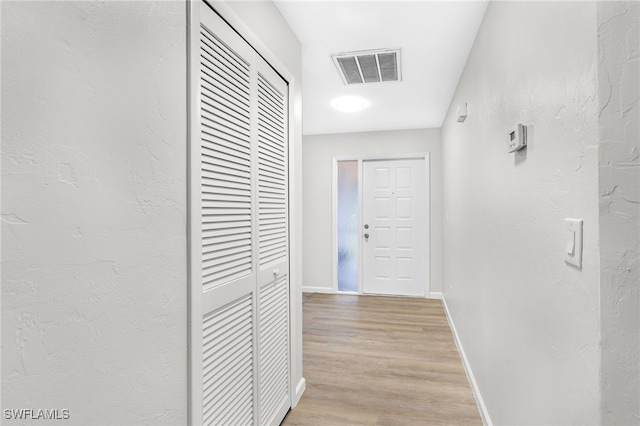 hall featuring light wood-type flooring