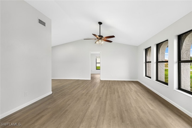 unfurnished living room featuring light hardwood / wood-style floors, lofted ceiling, and ceiling fan