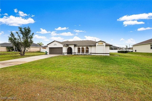 ranch-style house featuring a front yard and a garage