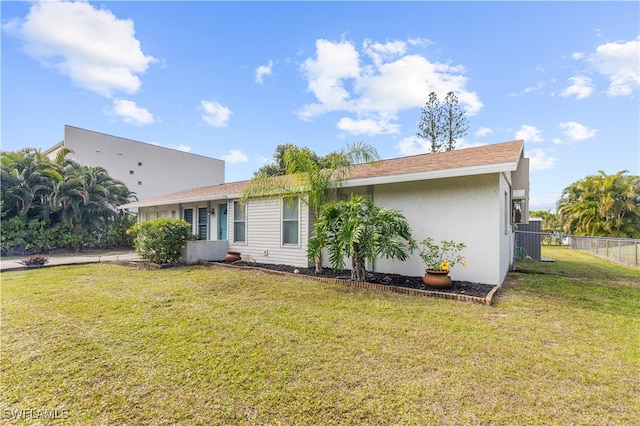 exterior space featuring a front lawn