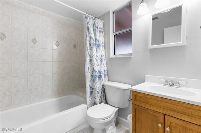 full bathroom featuring vanity, shower / bath combo, and toilet