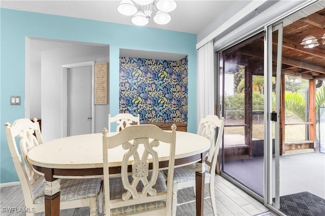 dining area with a chandelier