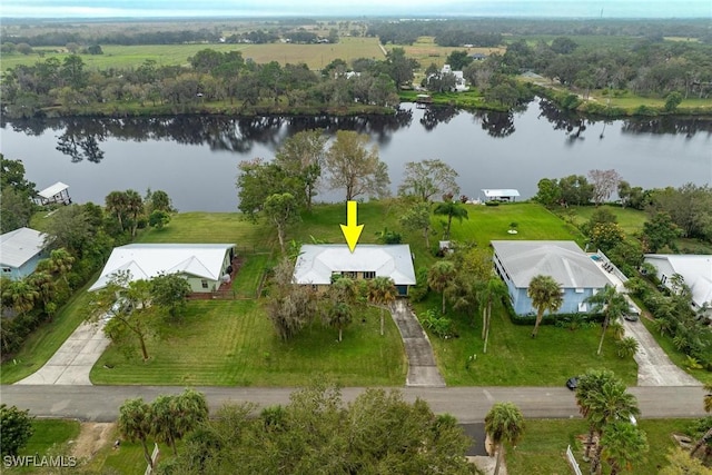 bird's eye view with a water view