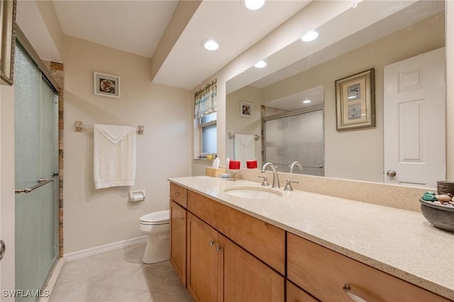 bathroom featuring toilet, tile patterned flooring, an enclosed shower, and vanity