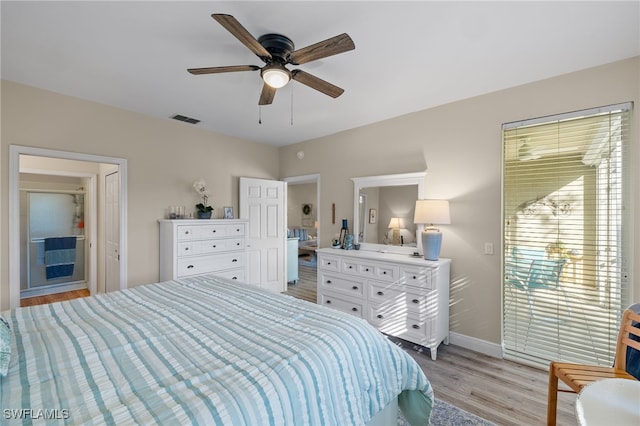 bedroom featuring light wood-type flooring and ceiling fan