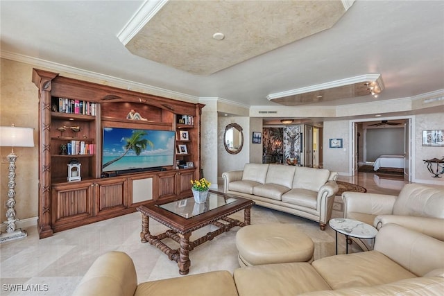 living room featuring crown molding