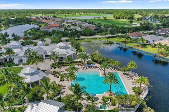 birds eye view of property featuring a water view