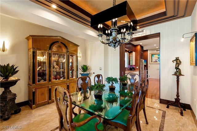 dining space with an inviting chandelier