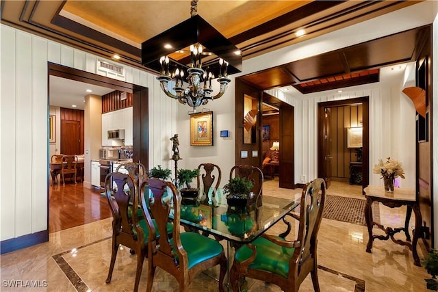 dining area with a notable chandelier