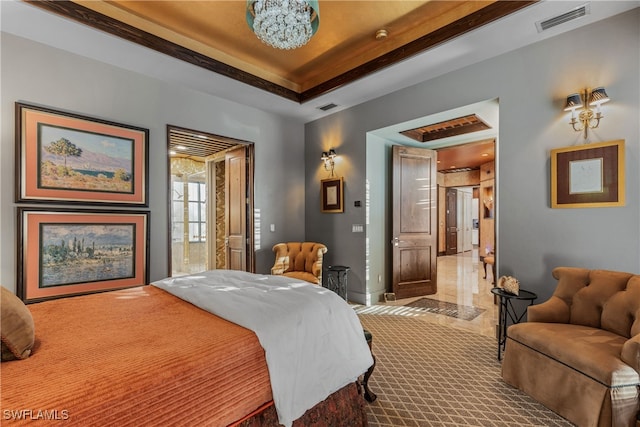 carpeted bedroom featuring a raised ceiling