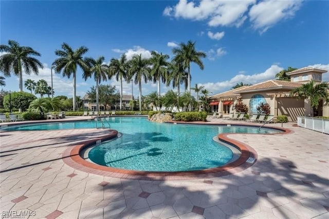 view of swimming pool featuring a patio