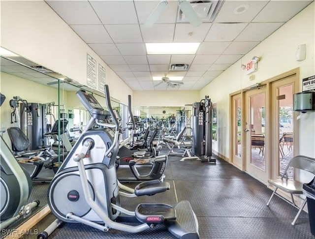 gym with a drop ceiling